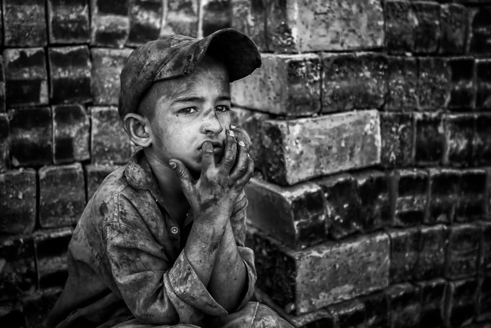 Contemplative Young Boy by Mohammadreza Momeni — canvas wall art