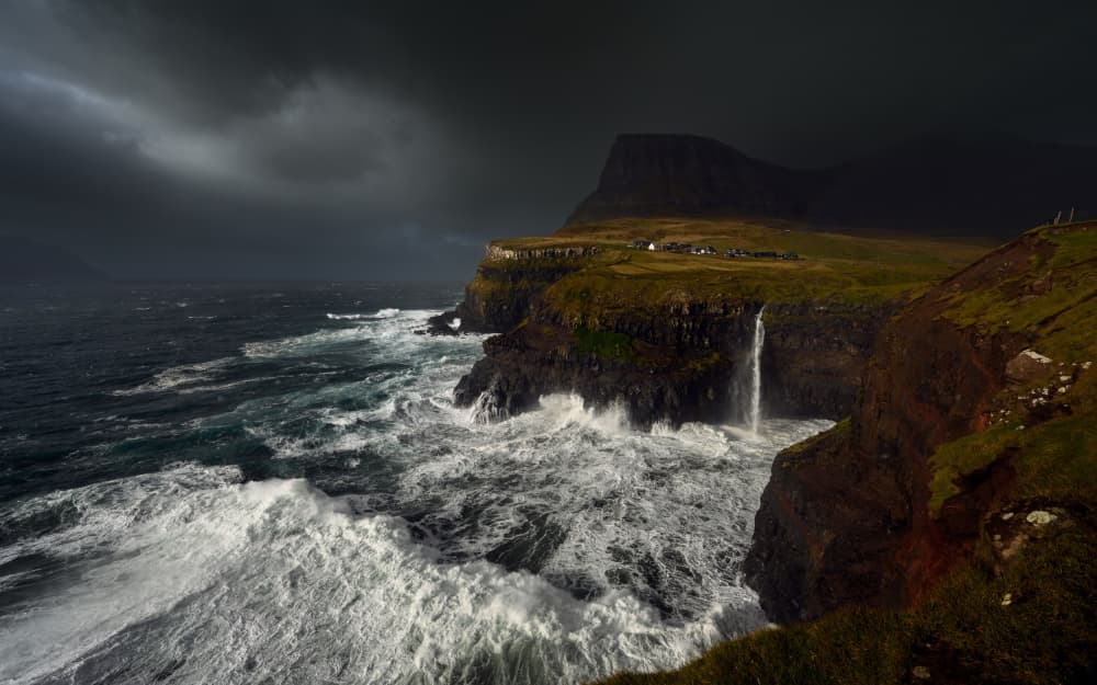 Dramatic Coastal Waterfall by Tomasz Rojek — canvas wall art