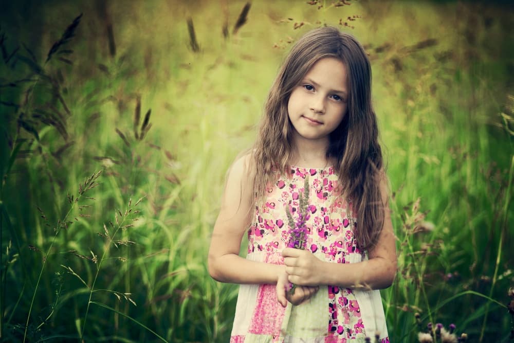 Girl In Summer Field by Elena Karagyozova — canvas wall art