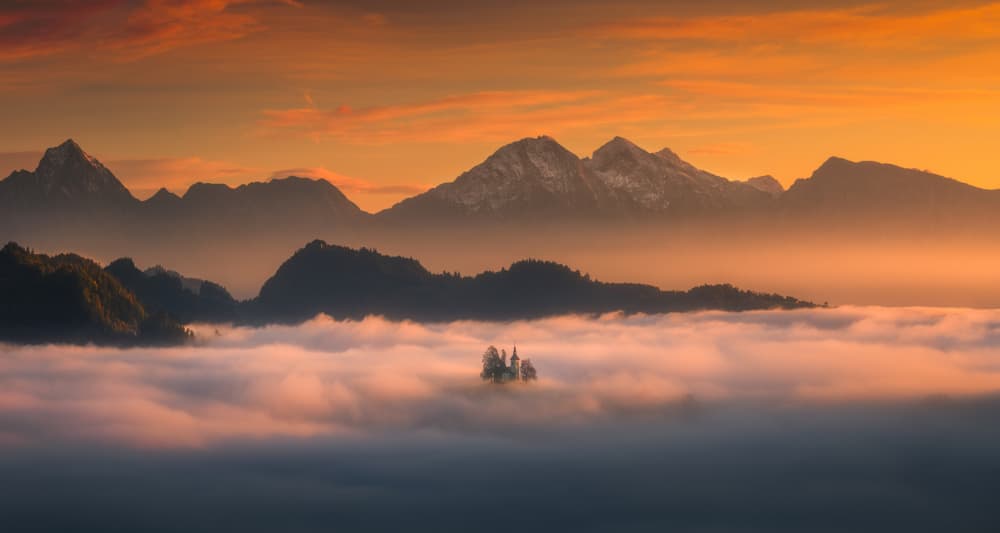 Misty Island Sunrise by Tomasz Rojek — canvas wall art