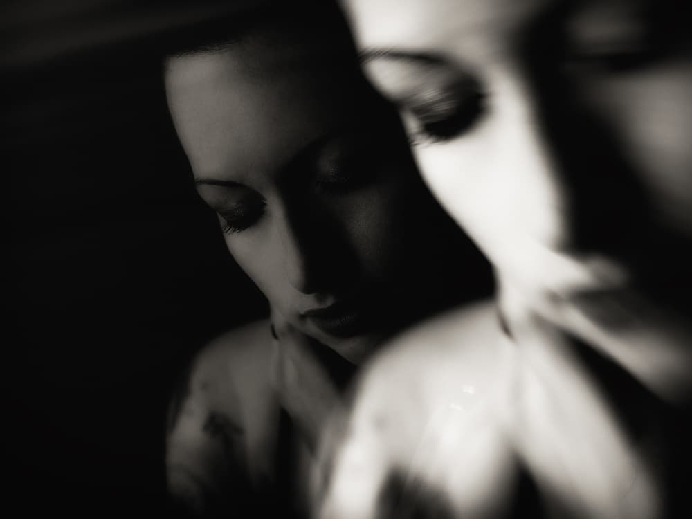 Pensive Woman's Reflection by Jacob Tuinenga — canvas wall art