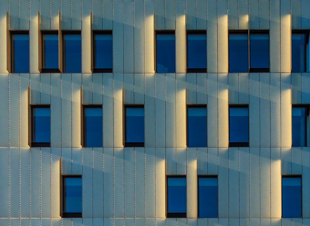 Sunlit Window Facade by Jef Van den Houte — canvas wall art