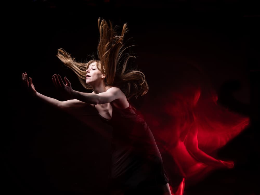 Dynamic Red Motion by Sam SDFMedia — canvas wall art