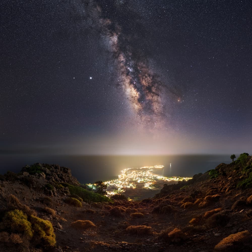 Milky Way Over Coastal City by Martin Strouhal QEP — canvas wall art