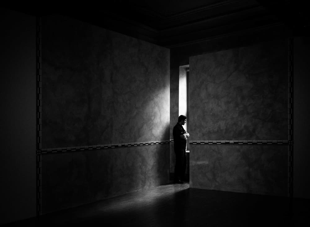 Contemplative Man Window Light by Ramiz Sahin — canvas wall art