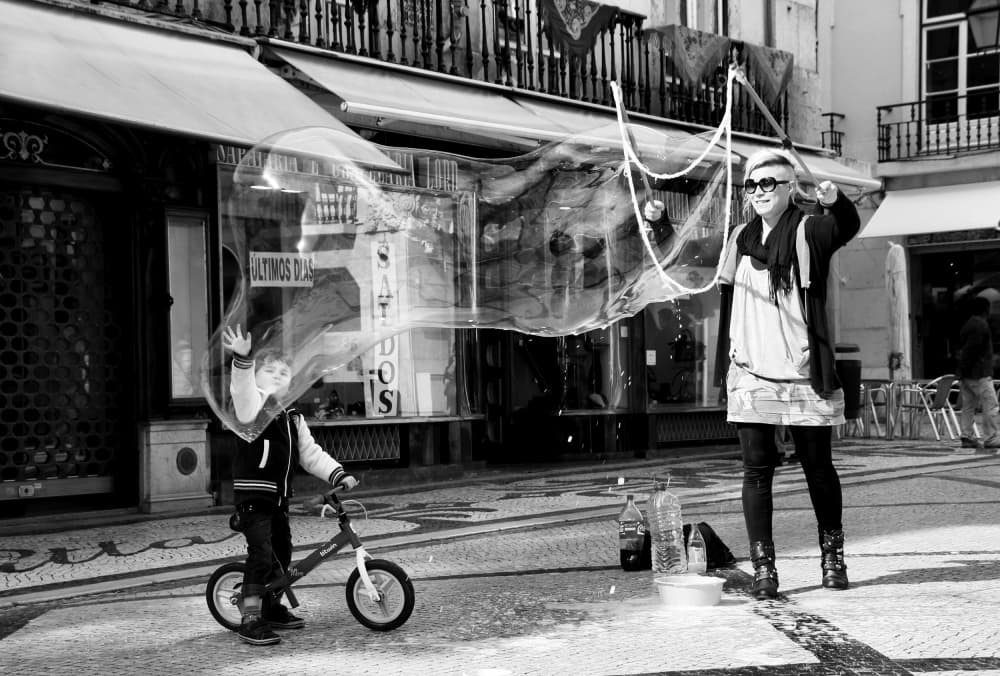 Boy In Giant Bubble by Fernando Alves — canvas wall art