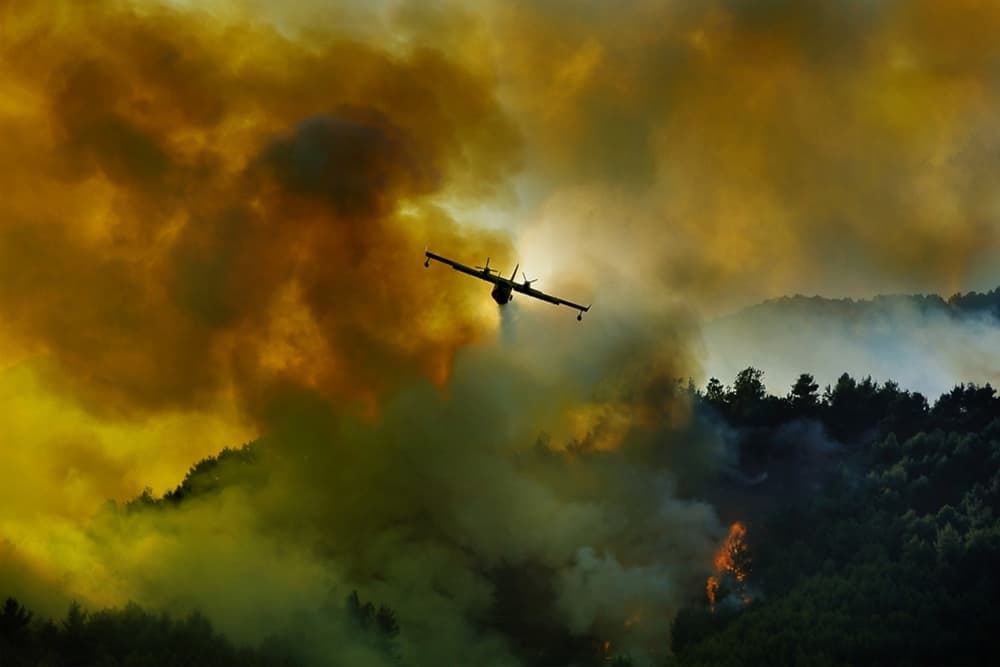 Firefighting Plane Water Drop by Antonio Grambone — canvas wall art