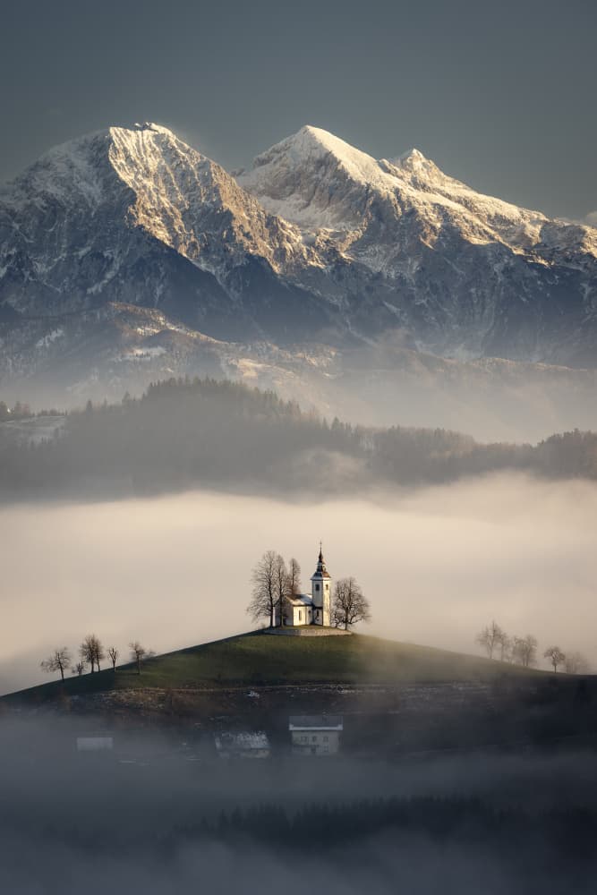Misty Alpine Church by Dan Mirica — canvas wall art