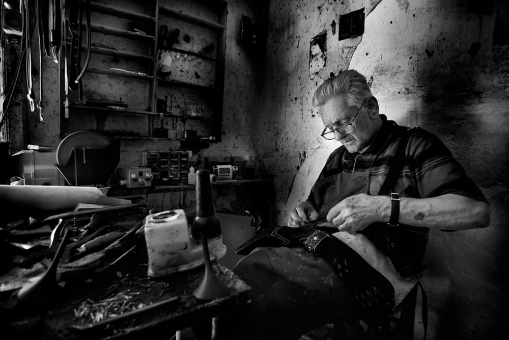 Old Shoemaker At Work by Antonio Grambone — canvas wall art