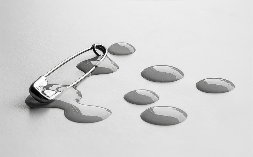 Safety Pin Liquid Drops by Giorgio Toniolo — canvas wall art