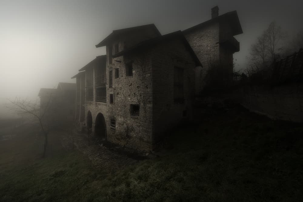 Eerie Stone House Fog by Filippo Manini — canvas wall art