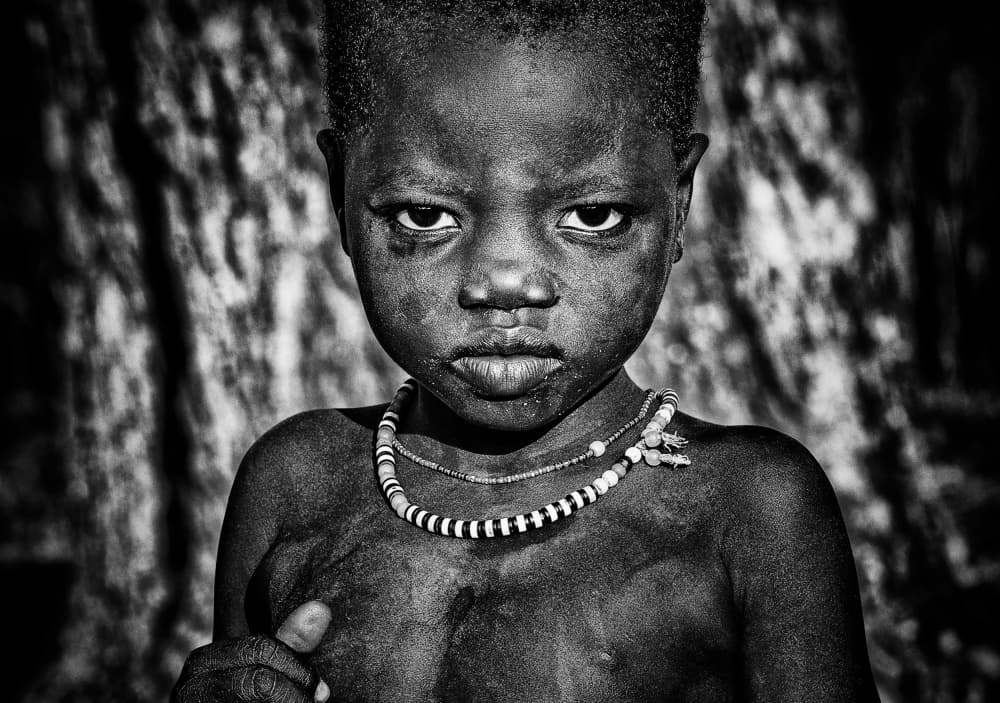 Intense Child Gaze by Joxe Inazio Kuesta Garmendia — canvas wall art
