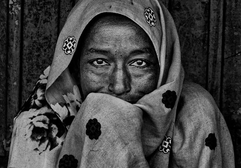 Woman's Intense Gaze by Joxe Inazio Kuesta Garmendia — canvas wall art