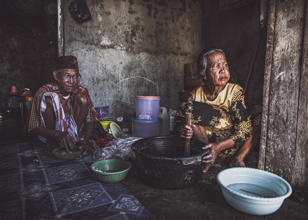 Elderly Couple Cooking by Marco Tagliarino — canvas wall art