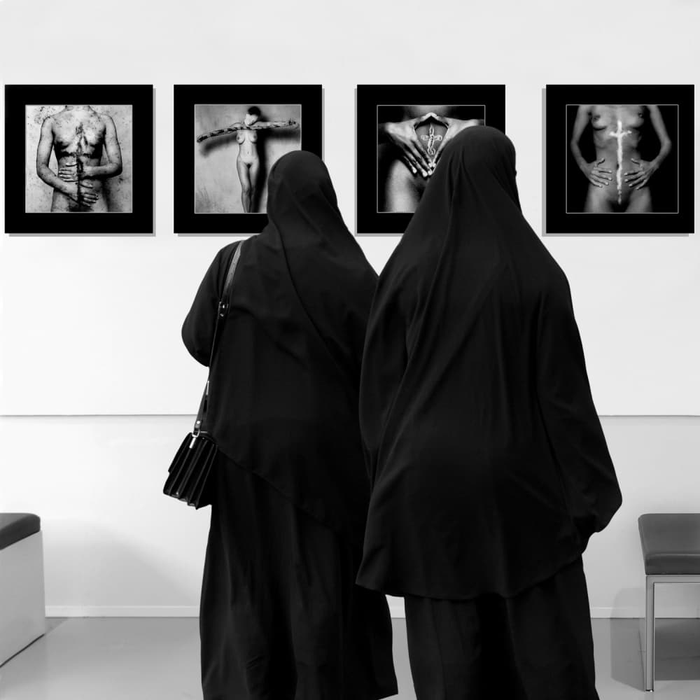Veiled Women Viewing Art by Huib Limberg — canvas wall art