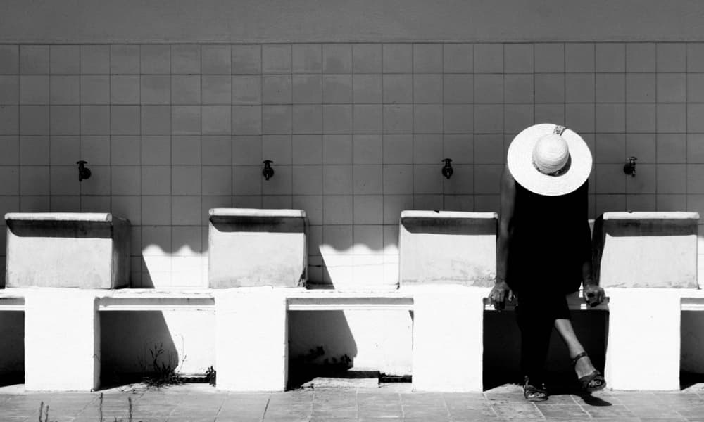 White Hat At The Fountains by Milena Seita — canvas wall art