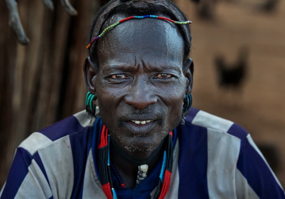 Tribal Elder Portrait by Joxe Inazio Kuesta Garmendia — canvas wall art