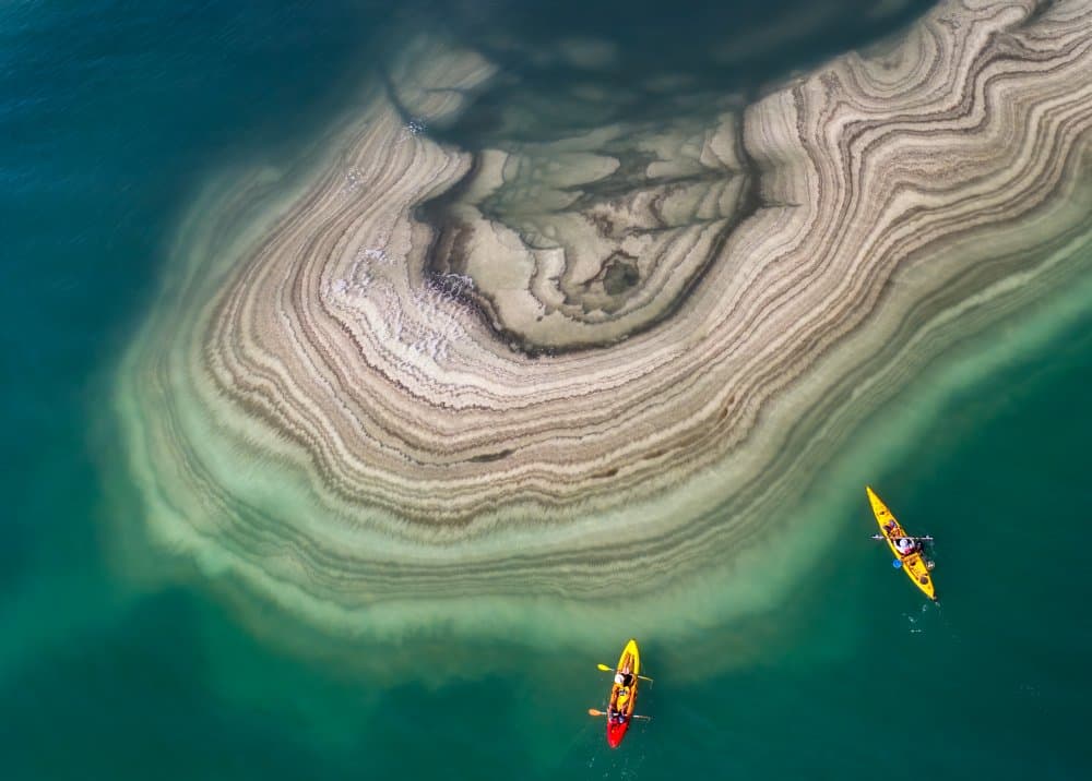 Kayaking Over Turquoise Patterns by Ido Meirovich — canvas wall art