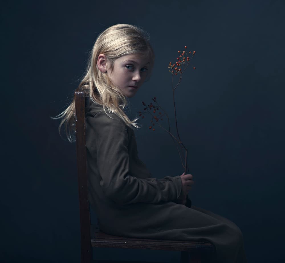 Pensive Girl With Berries by Ewa Cwikla — canvas wall art