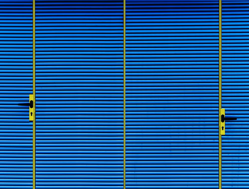 Yellow Framed Blue Doors by Jois Domont ( J.L.G.) — canvas wall art