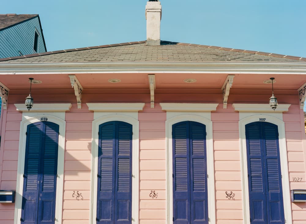 Pink House Blue Shutters by Bethany Young — canvas wall art