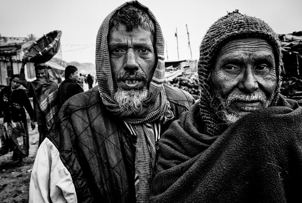 Two Indian Men's Gaze by Joxe Inazio Kuesta Garmendia — canvas wall art
