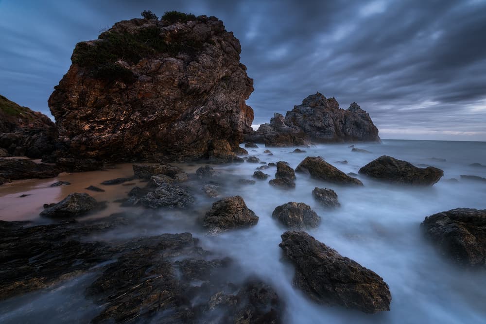 Moody Coastal Rocks by Joshua Zhang — canvas wall art