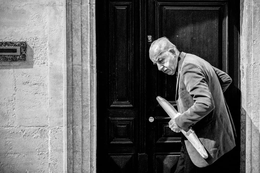 Elderly Man With Baguette by Boris Hristov — canvas wall art