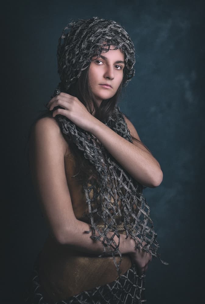 Woman In Net Headwrap by Joan Gil Raga — canvas wall art