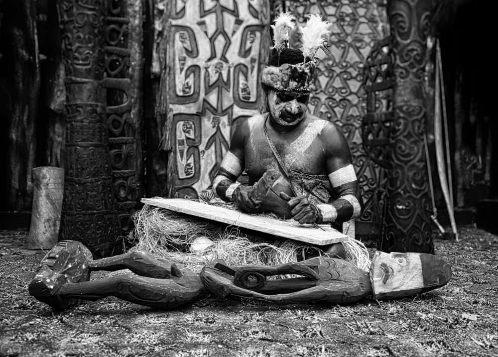 Traditional Wood Carver by Antonyus Bunjamin (Abe) — canvas wall art