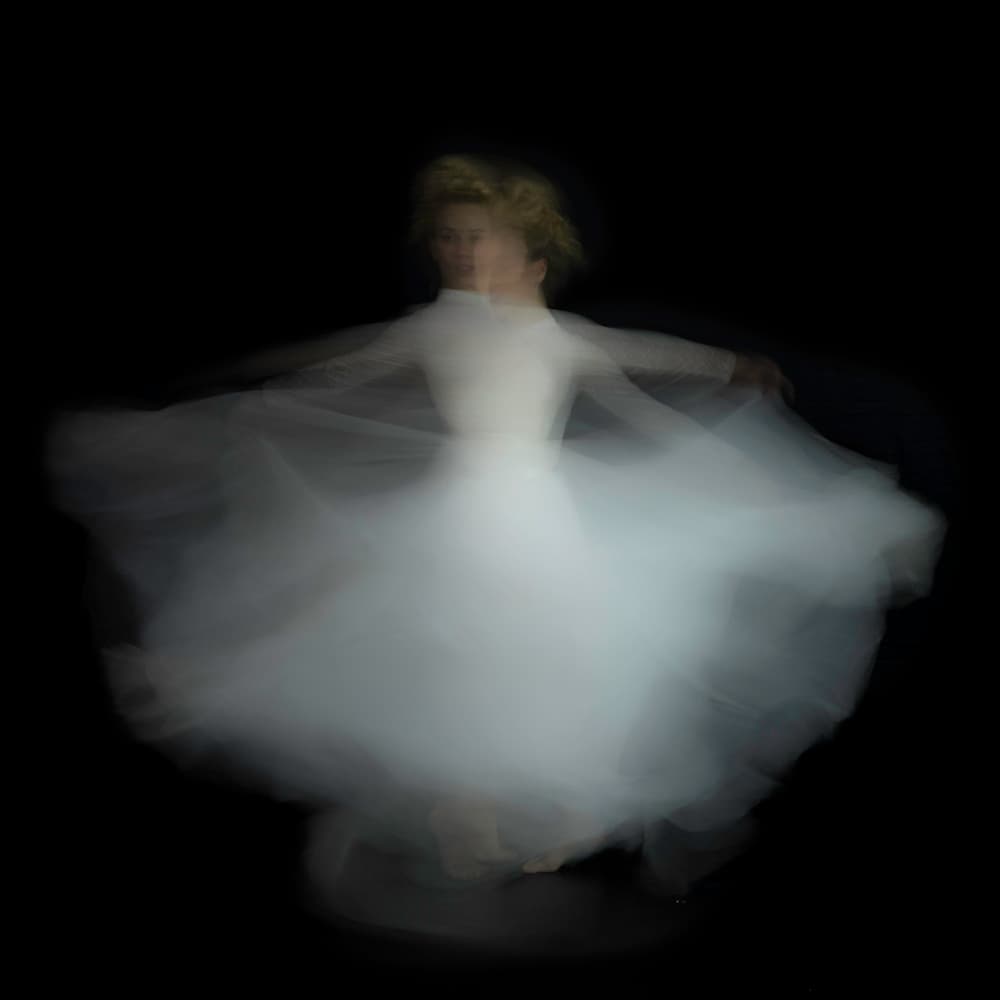 Whirling White Dress by Amnon Eichelberg — canvas wall art