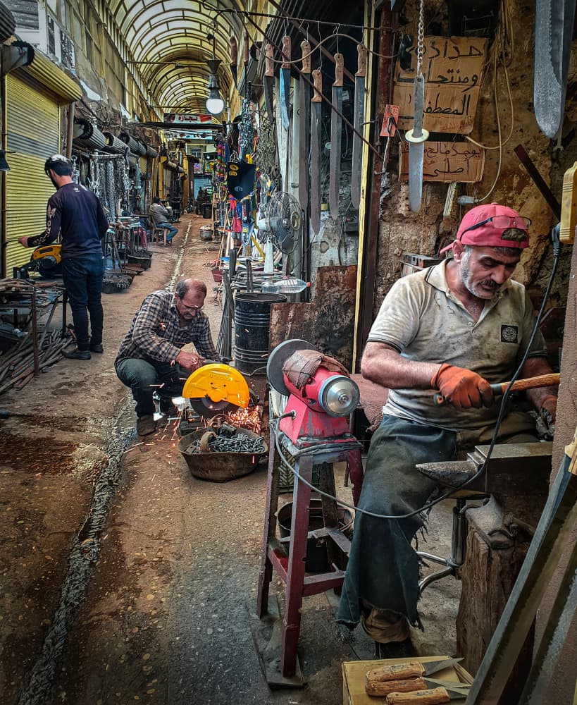 Souk Artisans at Work by Bashar Alsofey — canvas wall art