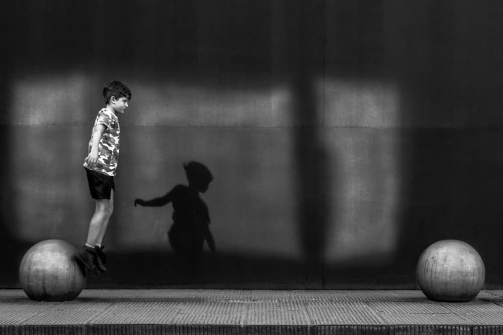 Boy Jumping Shadow by Francesco Martinelli — canvas wall art