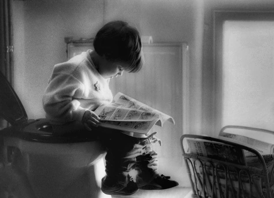 Focused Little Reader by Yvette Depaepe — canvas wall art