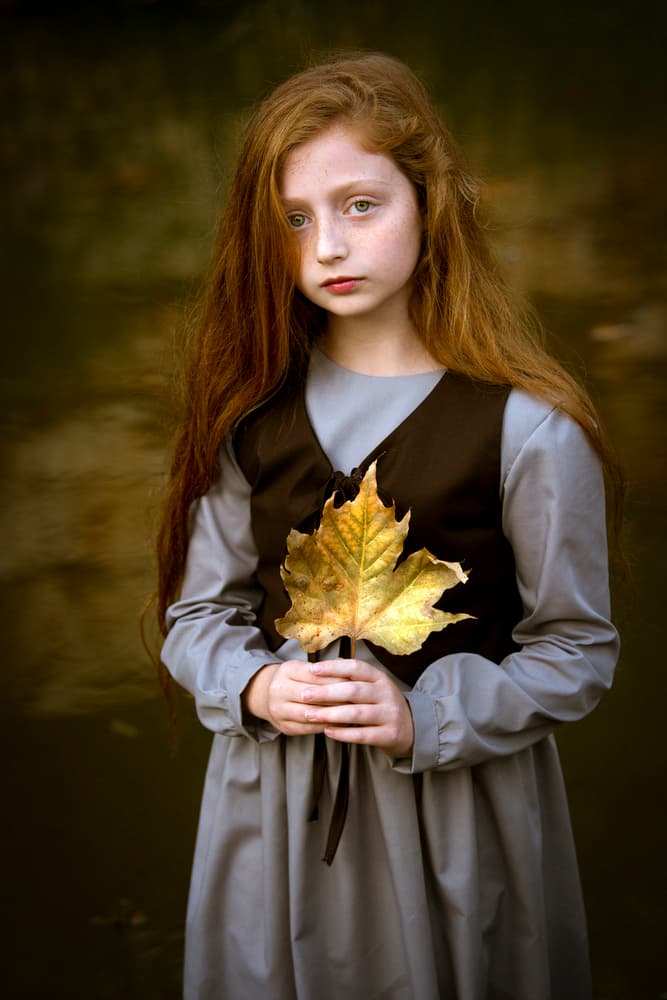 Pensive Girl Golden Leaf by Eyal Amer — canvas wall art