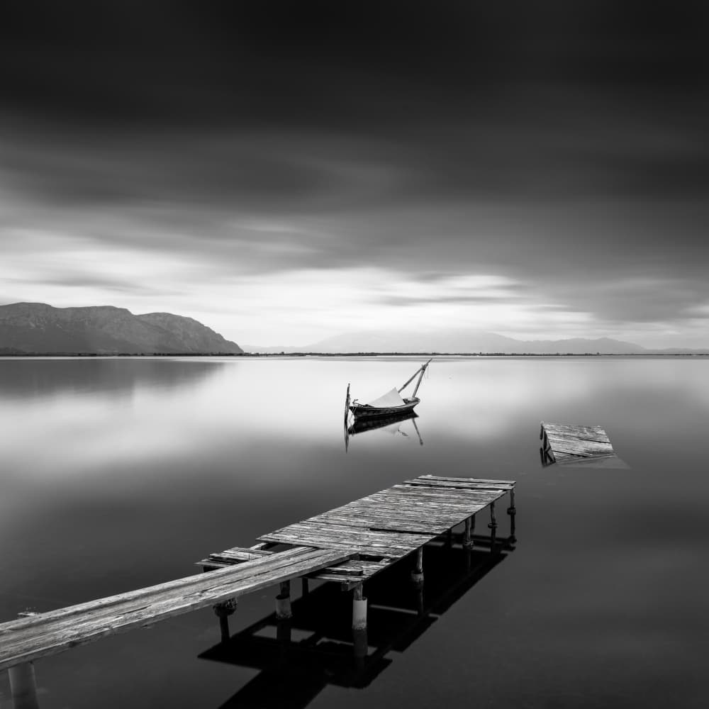 Lonely Pier and Boat by George Digalakis — canvas wall art