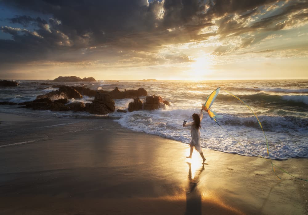 Girl Flying Kite Sunset by Dianne Mao — canvas wall art