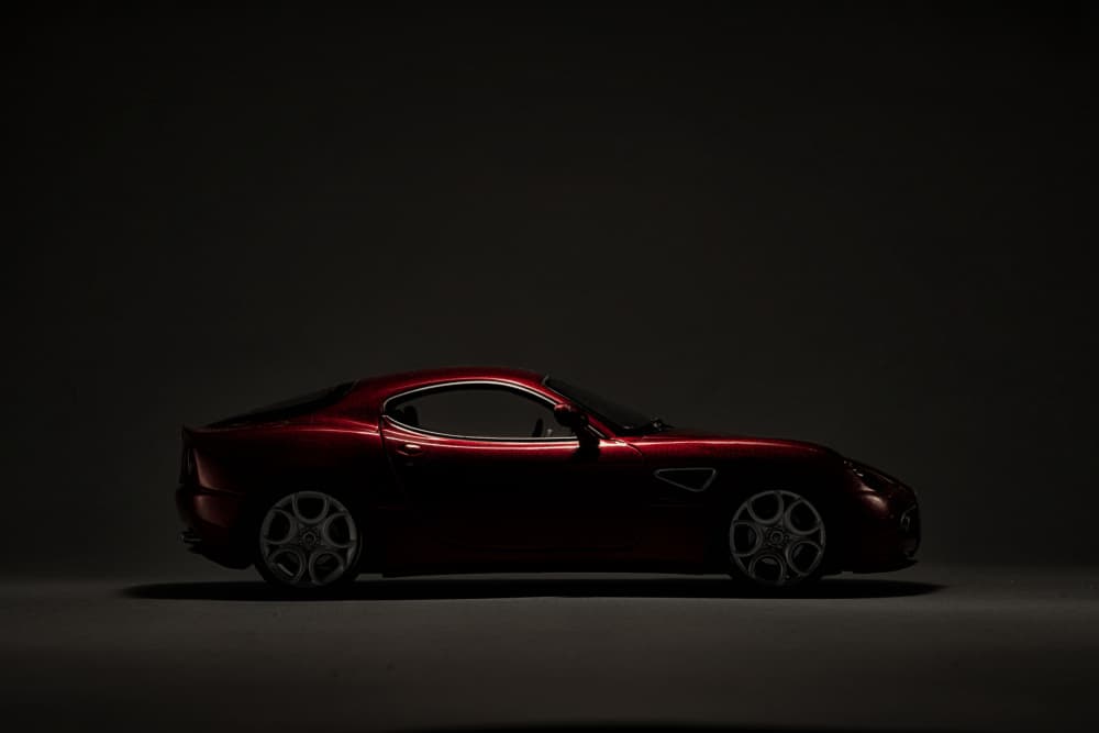 Sleek Red Coupe by Roland Weber — canvas wall art