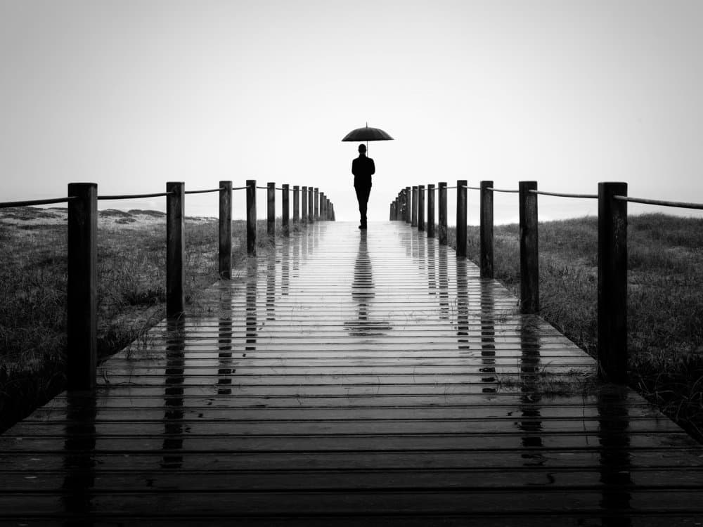Umbrella Man Misty Boardwalk by Marco Faria — canvas wall art