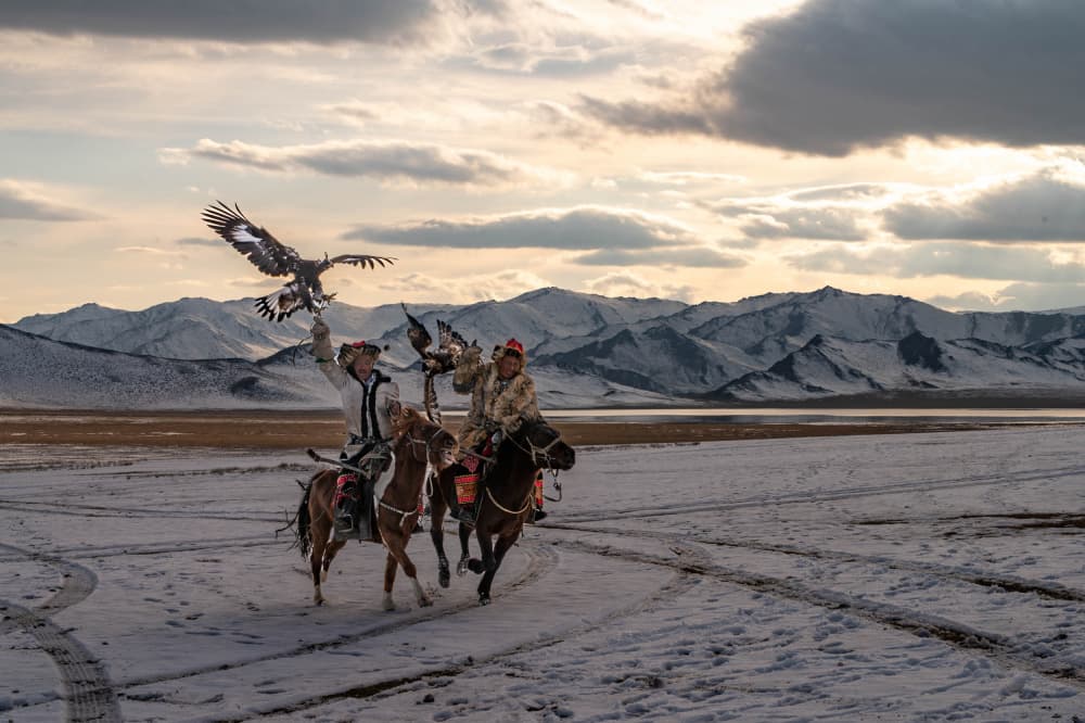 Eagle Hunters Snowy Mountains by Ilana Lam — canvas wall art