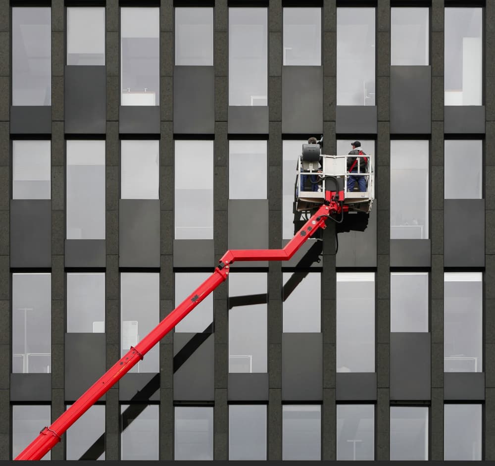 Window Washers on Modern Building by Karin Kilb — canvas wall art