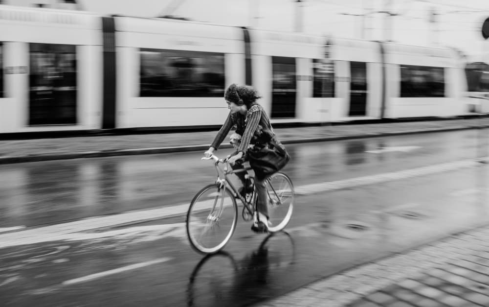 Rainy City Bike Ride by Itzik Einhorn — canvas wall art