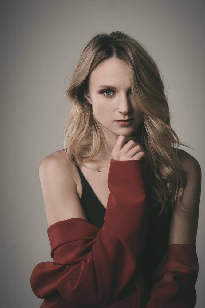 Captivating Woman in Red by Dariusz Budyta — canvas wall art