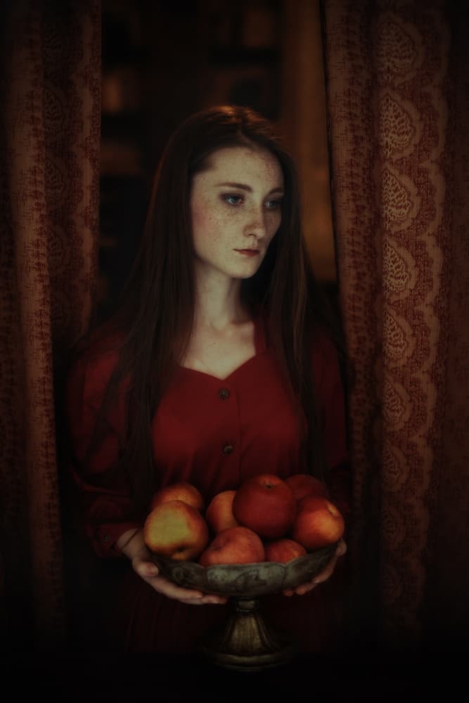 Pensive Girl With Fruit by Raluca Arhire — canvas wall art