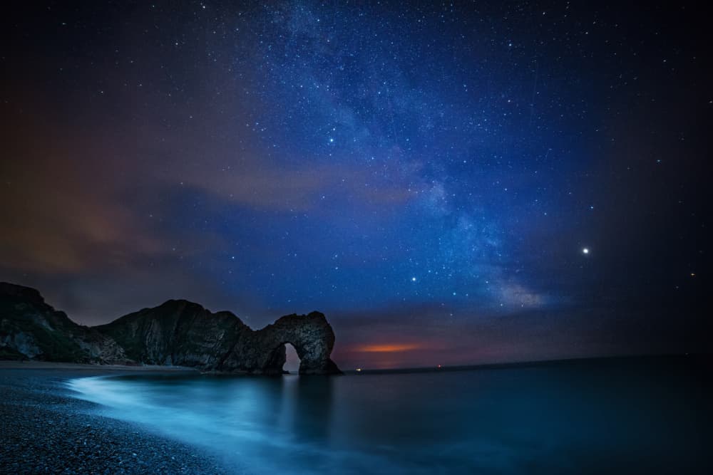 Milky Way Over Durdle Door by Radojica Jevric fotorax — canvas wall art