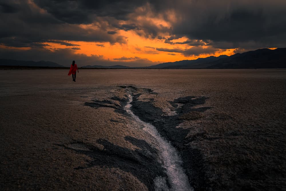 Red Cloak Desert Journey by Lydia Jacobs — canvas wall art