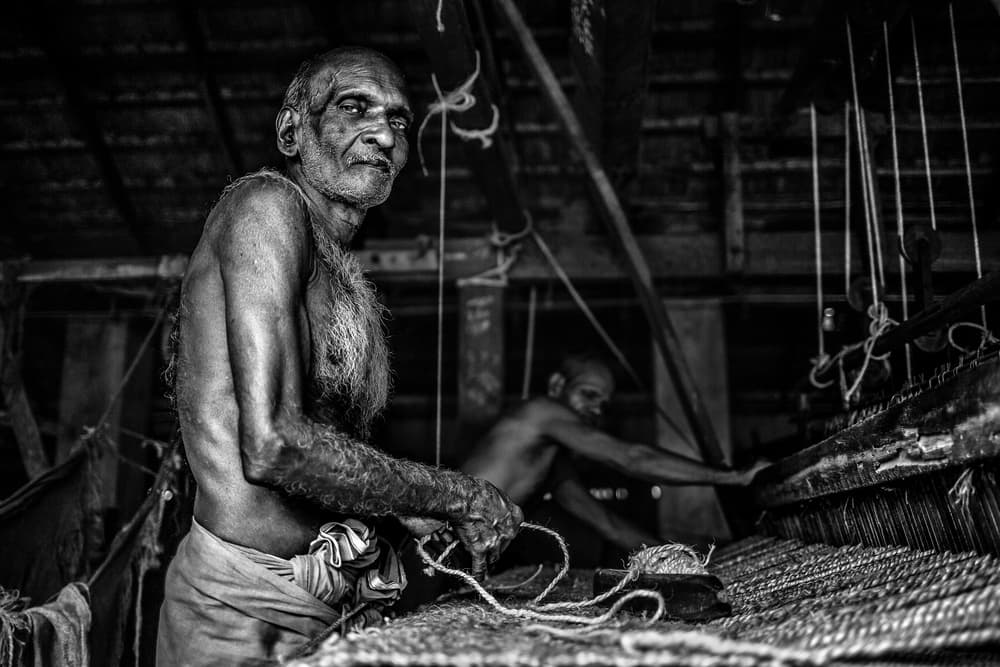 Old Weaver at Work by Marco Tagliarino — canvas wall art