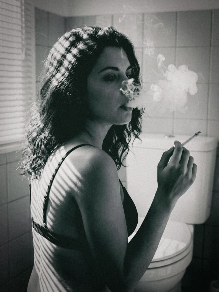 Smoking Woman in Shadows by Andreas Magnusson — canvas wall art