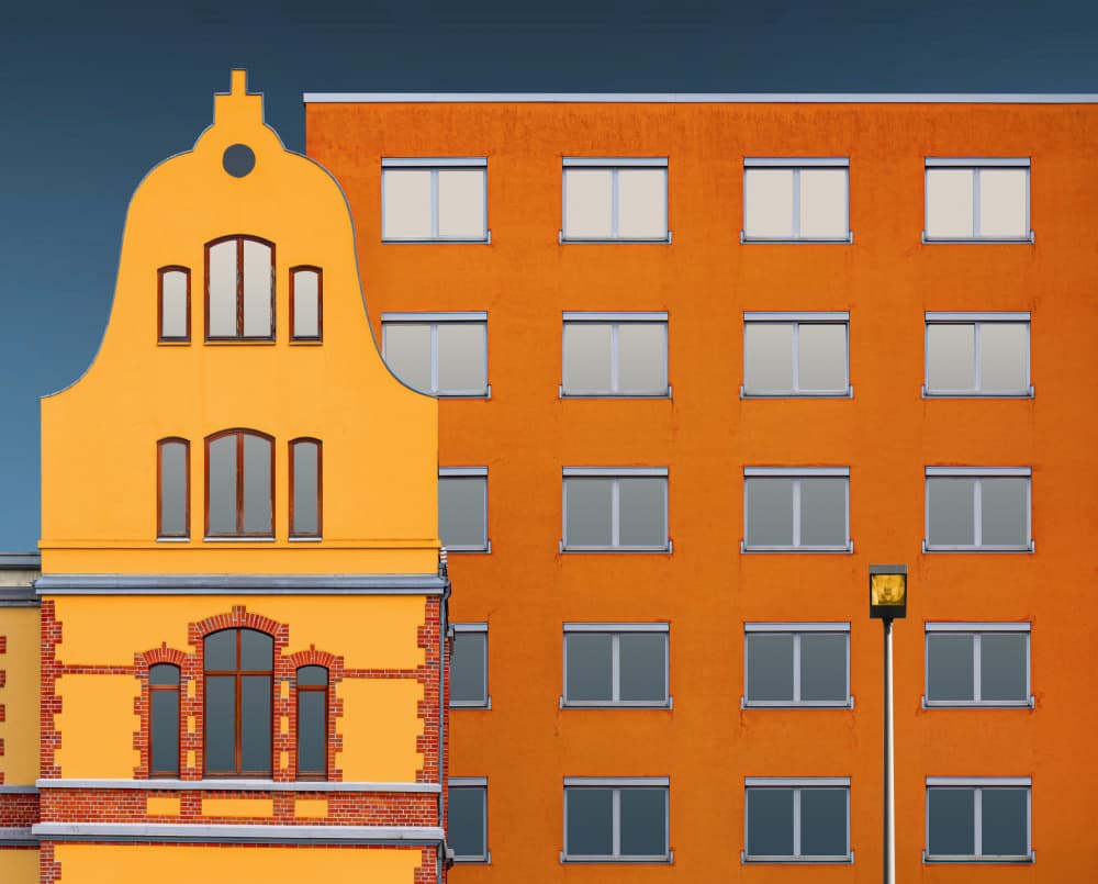 Vibrant Architectural Contrast by Roland M Schwerdtfeger — canvas wall art