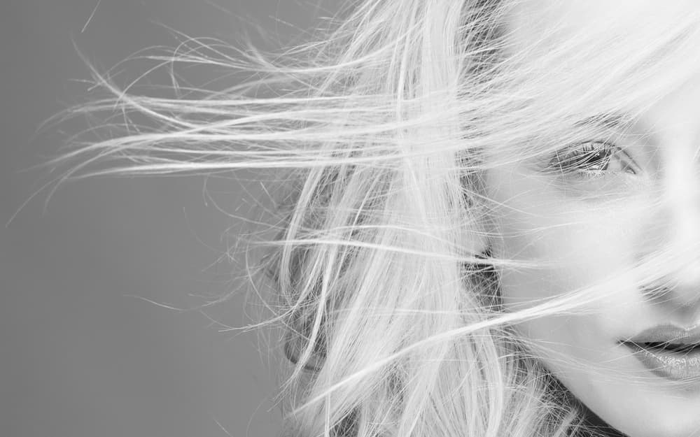 Windblown Blonde Portrait by Howard Ashton-Jones — canvas wall art